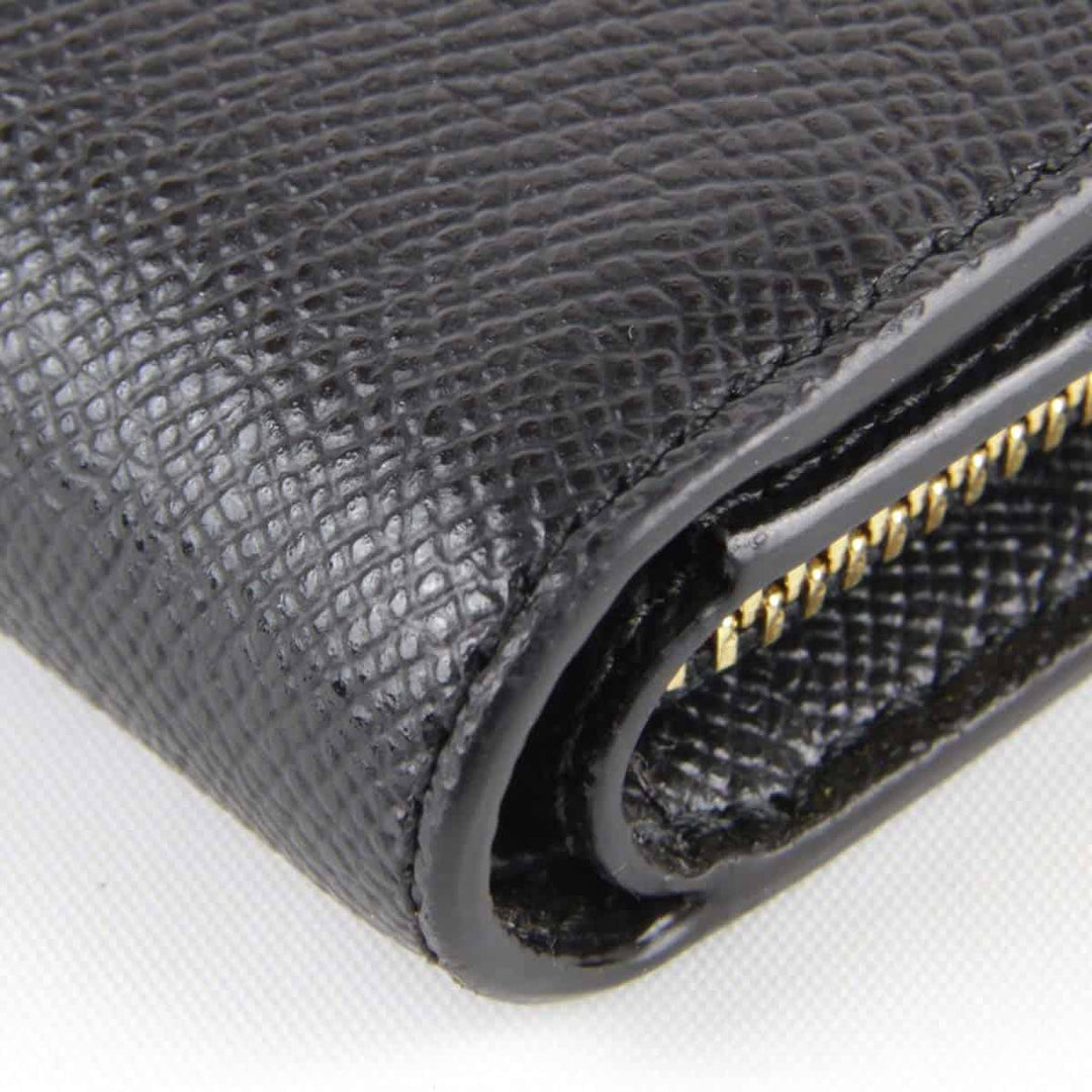 美品『USED』 
COACH コーチ 
 二つ折り財布 
レザー ブラック