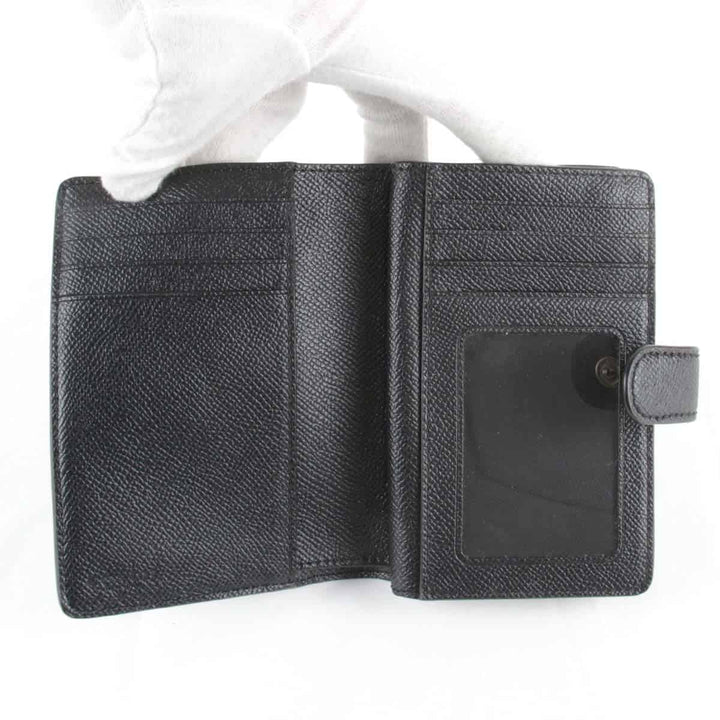 美品『USED』 
COACH コーチ 
 二つ折り財布 
レザー ブラック