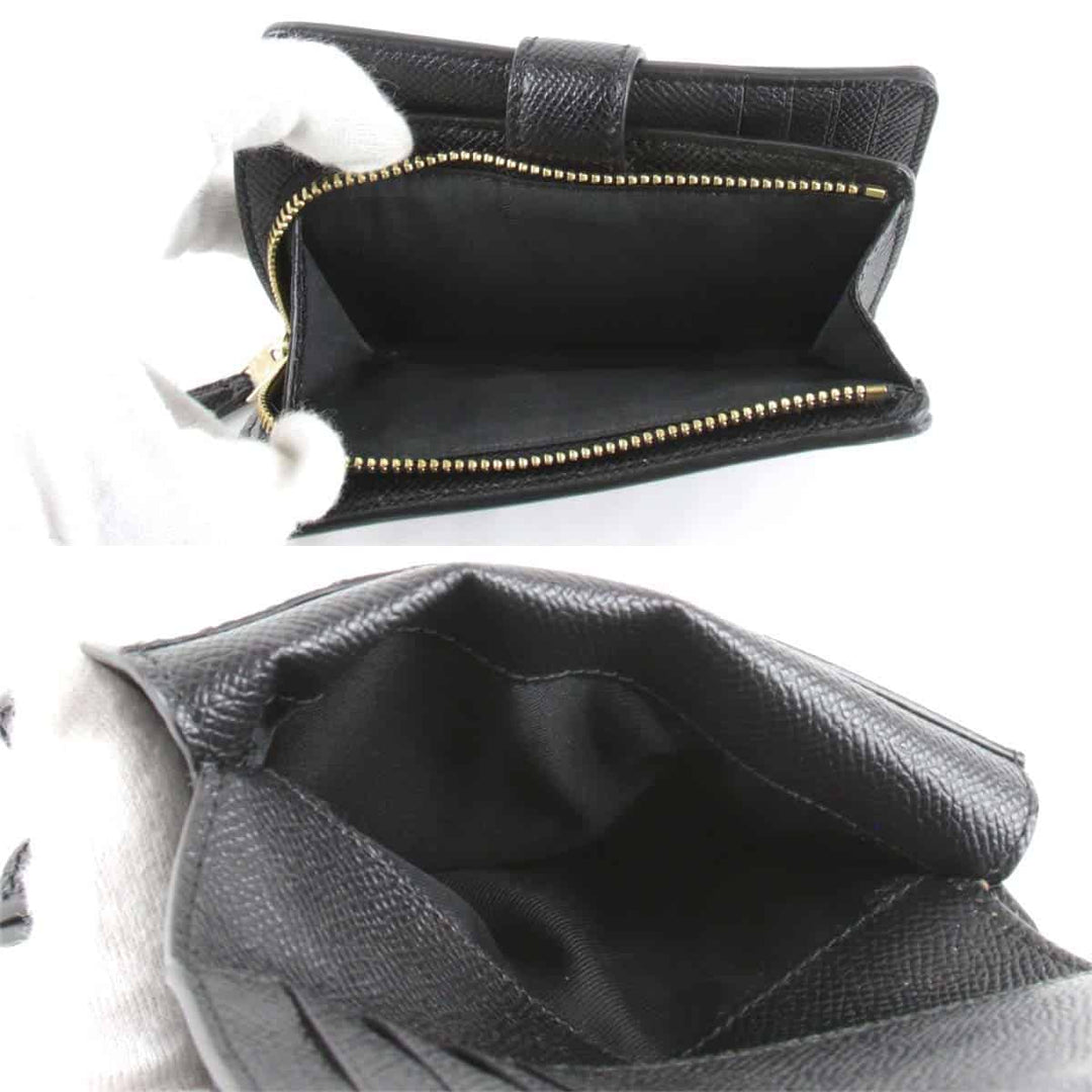 美品『USED』 
COACH コーチ 
 二つ折り財布 
レザー ブラック