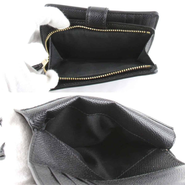美品『USED』 
COACH コーチ 
 二つ折り財布 
レザー ブラック