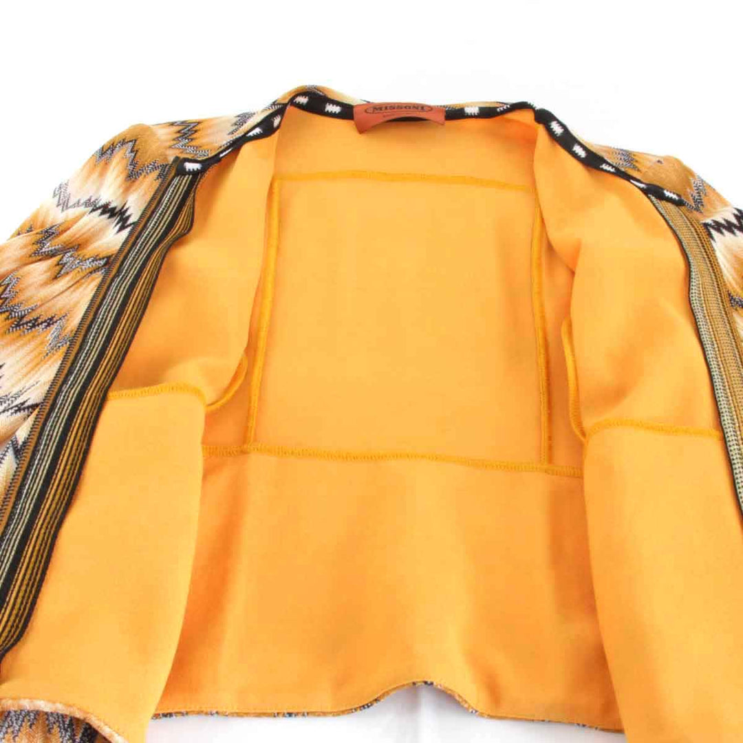 美品『USED』 
Missoni ミッソーニ 
 ジップアップ 168161 ノーカラージャケット 
レーヨン/ポリウレタン  オレンジ