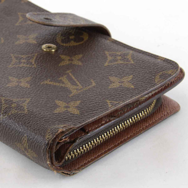 『USED』 
LOUIS VUITTON ルイ・ヴィトン 
 ポルトパピエ・ジップ M61207 二つ折り財布 
モノグラムキャンバス ブラウン