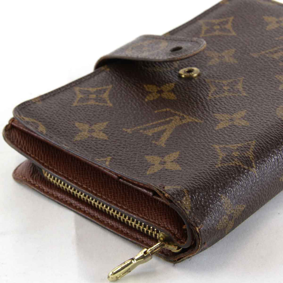 『USED』 
LOUIS VUITTON ルイ・ヴィトン 
 ポルトパピエ・ジップ M61207 二つ折り財布 
モノグラムキャンバス ブラウン