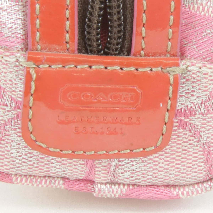 『USED』 
COACH コーチ 
 シグネチャー ポーチ 
キャンバス ピンク