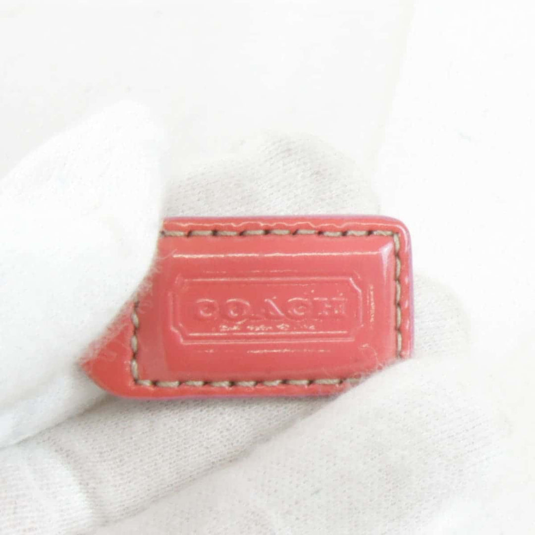 『USED』 
COACH コーチ 
 シグネチャー ポーチ 
キャンバス ピンク