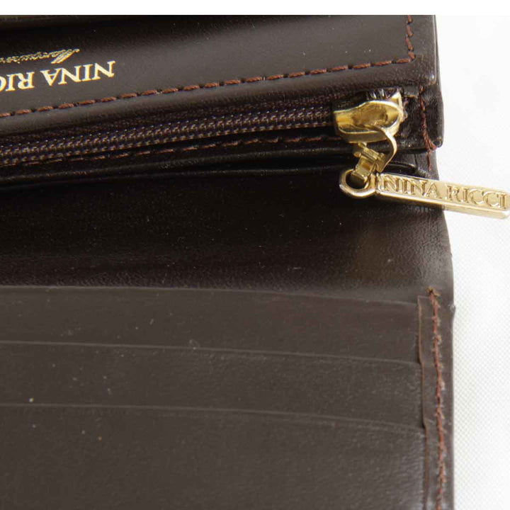 『USED』 
NINA RICCI ニナリッチ 
 ジラフ柄 二つ折り財布 
レザー ブラウン
