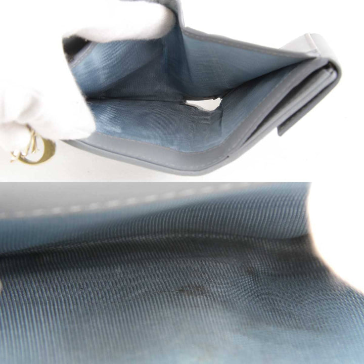 『USED』 
Christian Dior クリスチャンディオール 
 カナージュ ロータスウォレット 41-MA-0262 三つ折り財布 
ラムスキン ライトブルー