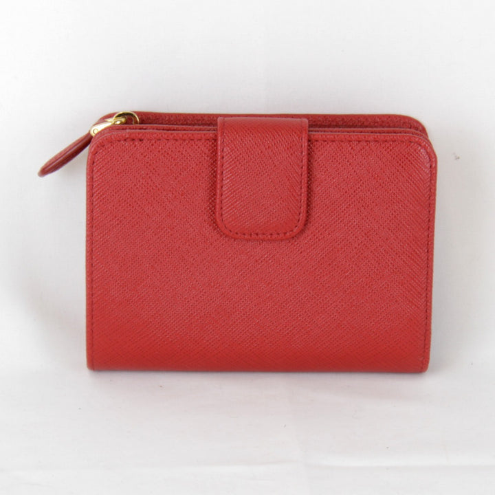 美品『USED』 
PRADA プラダ 
 サフィアーノIML018 二つ折り財布 
レザー レッド