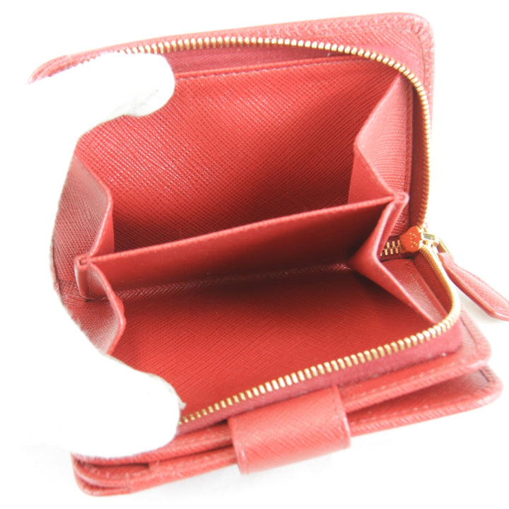 美品『USED』 
PRADA プラダ 
 サフィアーノIML018 二つ折り財布 
レザー レッド