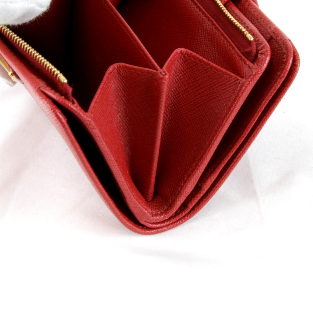 美品『USED』 
PRADA プラダ 
 サフィアーノIML018 二つ折り財布 
レザー レッド