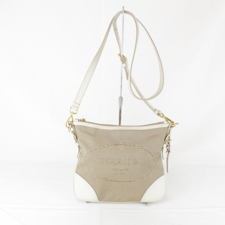 『USED』 
PRADA プラダ 
 ロゴジャガード ショルダーバッグ 
キャンバス ベージュ