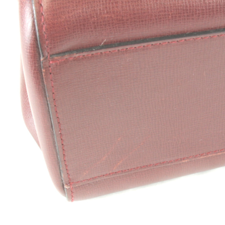 『USED』 
CARTIER カルティエ 
 マストライン ターンロック ショルダー カード有 ショルダーバッグ 
レザー ワインレッド