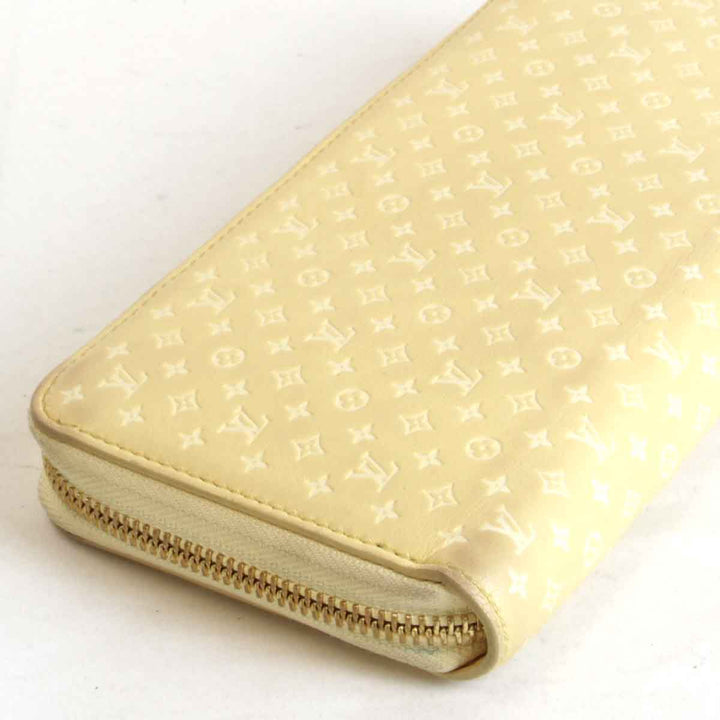 『USED』 
LOUIS VUITTON ルイ・ヴィトン 
 ナノモノグラム ジッピーウォレット M82229 長財布 
レザー イエロー