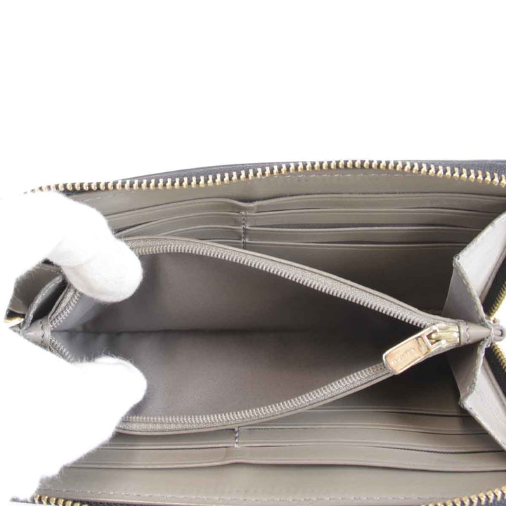 『USED』 
COACH コーチ 
 F57318 長財布 
PVC/レザー  ブラウン