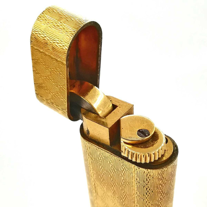 ジャンク『USED/動作未確認』 
CARTIER カルティエ 
 ガスライター ライター 
メタル ゴールド