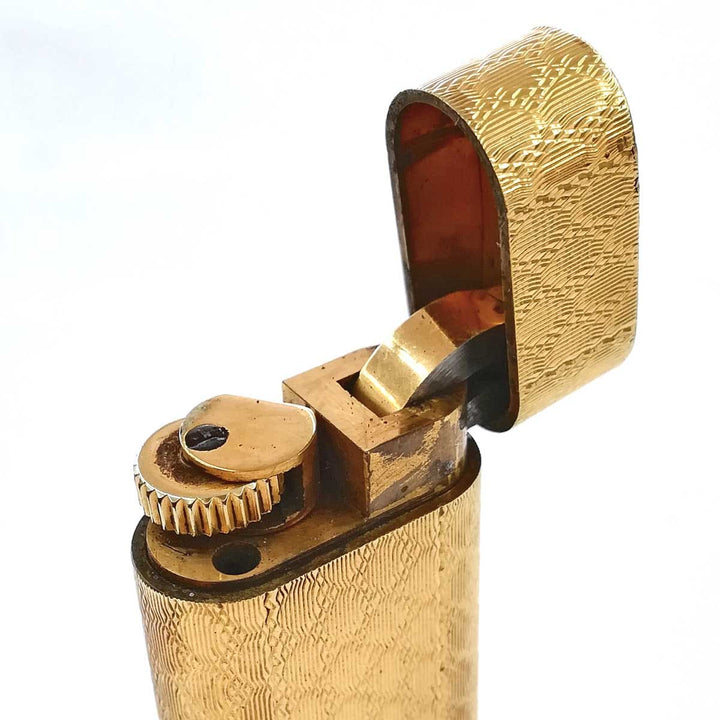 ジャンク『USED/動作未確認』 
CARTIER カルティエ 
 ガスライター ライター 
メタル ゴールド