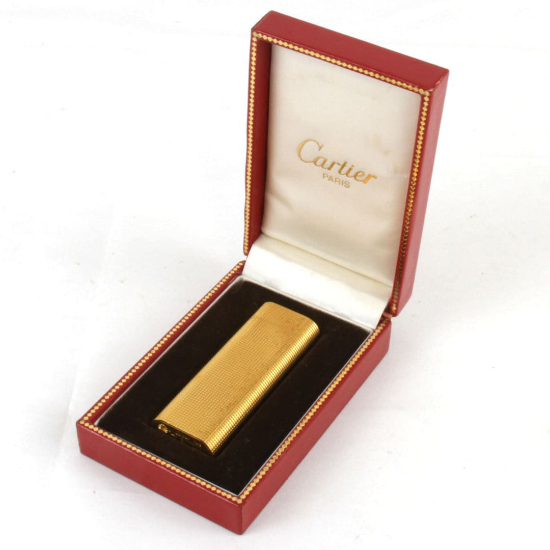 ジャンク『動作未確認』 
CARTIER カルティエ 
 ガスライター 箱付 ライター 
メタル ゴールドカラー