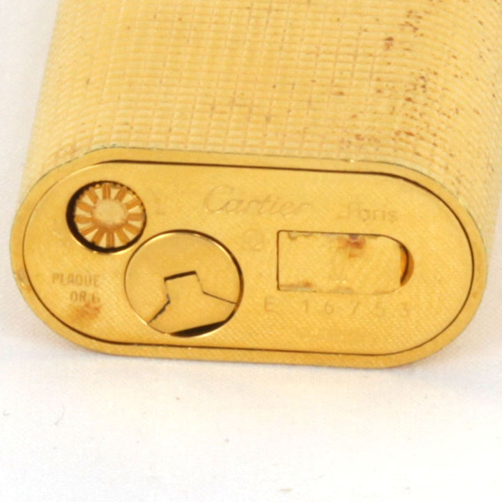 ジャンク『動作未確認』 
CARTIER カルティエ 
 ガスライター 箱付 ライター 
メタル ゴールドカラー
