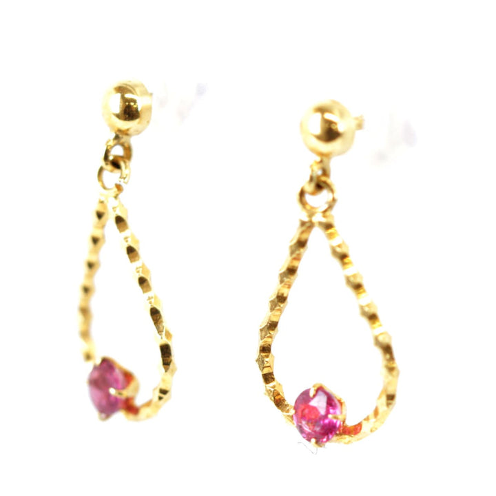 『USED』 K18 
 赤石付きピアス ピアス
 0.75g