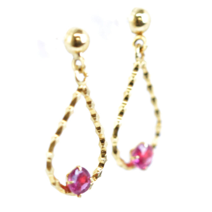 『USED』 K18 
 赤石付きピアス ピアス
 0.75g