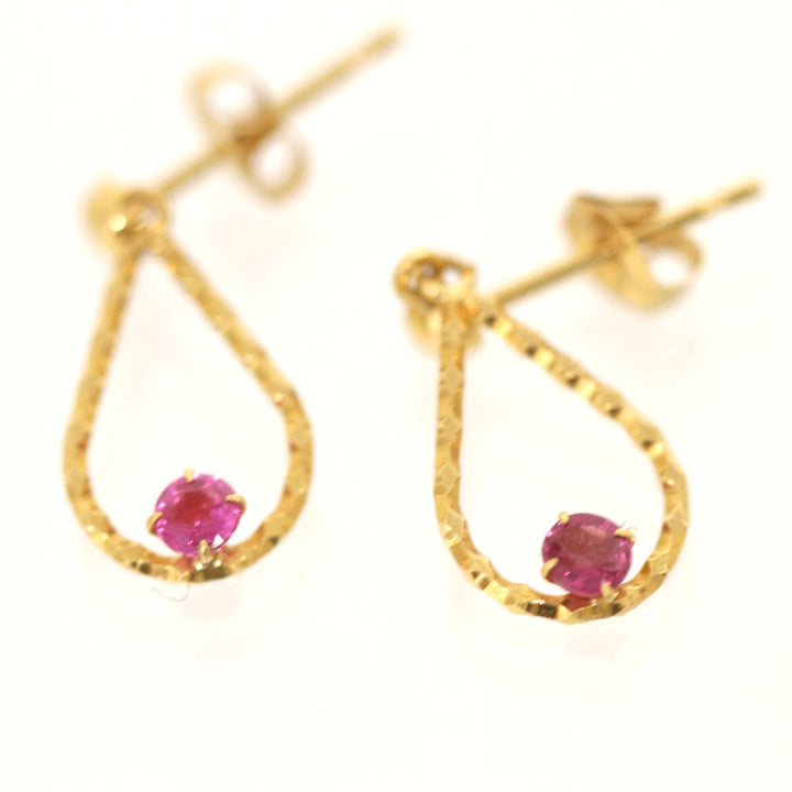 『USED』 K18 
 赤石付きピアス ピアス
 0.75g