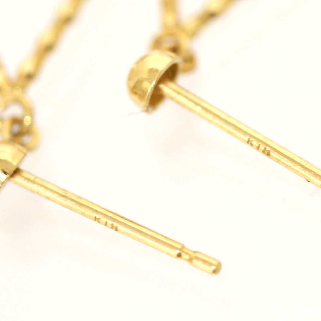 『USED』 K18 
 赤石付きピアス ピアス
 0.75g