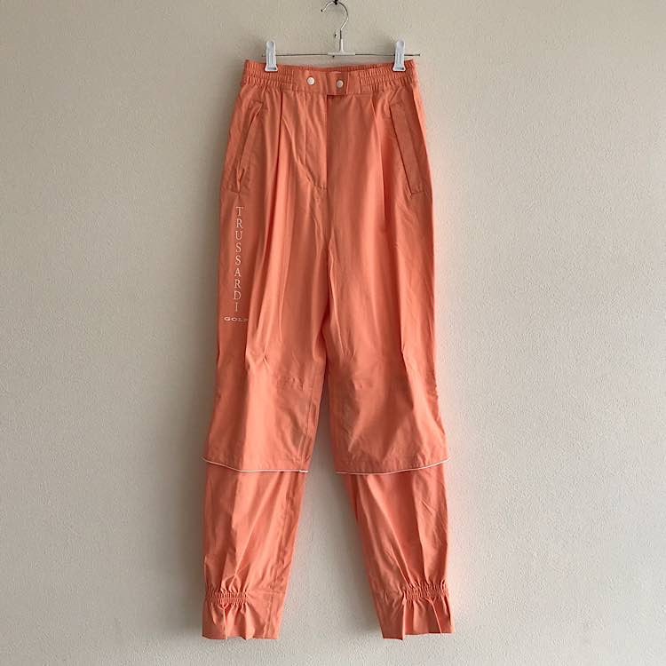 『美品』 
TRUSSARDI トラサルディ 
 ゴルフ ナイロンウェア スポーツウェア ジャケット パンツ サイズ38 セットアップ 
ナイロン コーラル