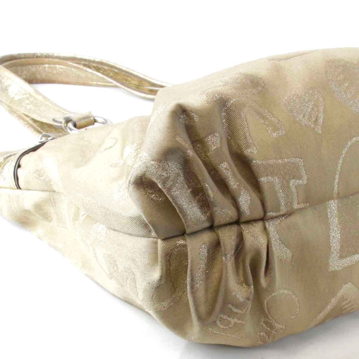 『USED』 
COACH コーチ 
 ポピー C1069-15301 トートバッグ 
キャンバス ゴールド