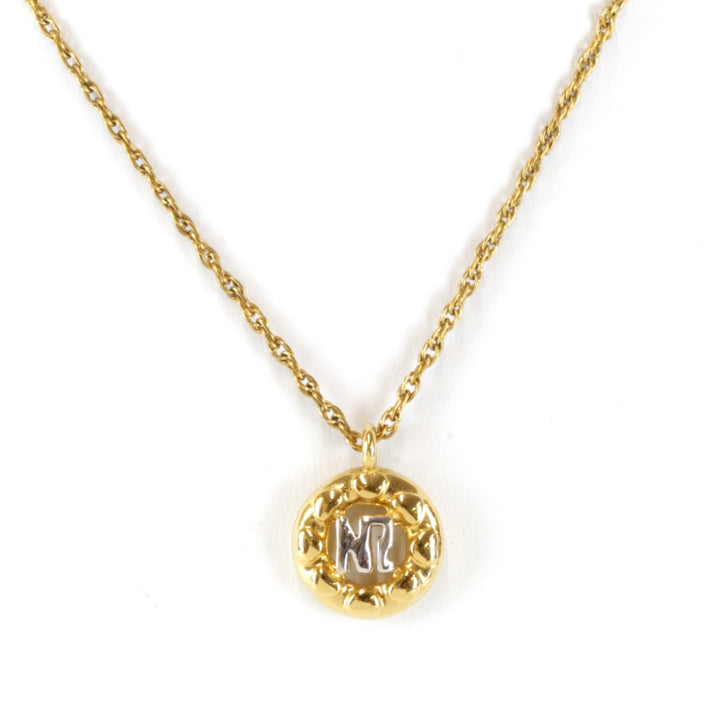 良品『USED』 
NINA RICCI ペンダント ロゴ ネックレス
