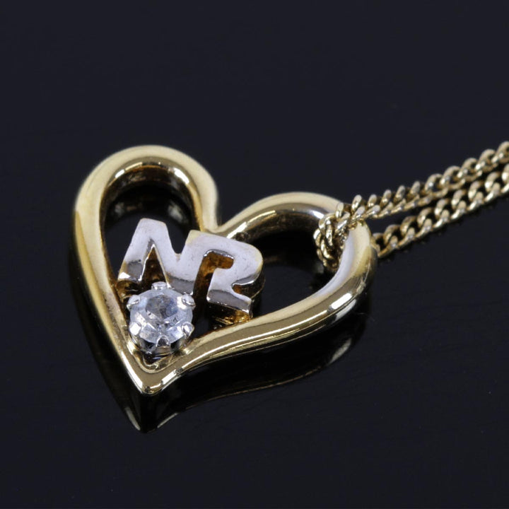 美品『USED』  
NINA RICCI  ハート ネックレス