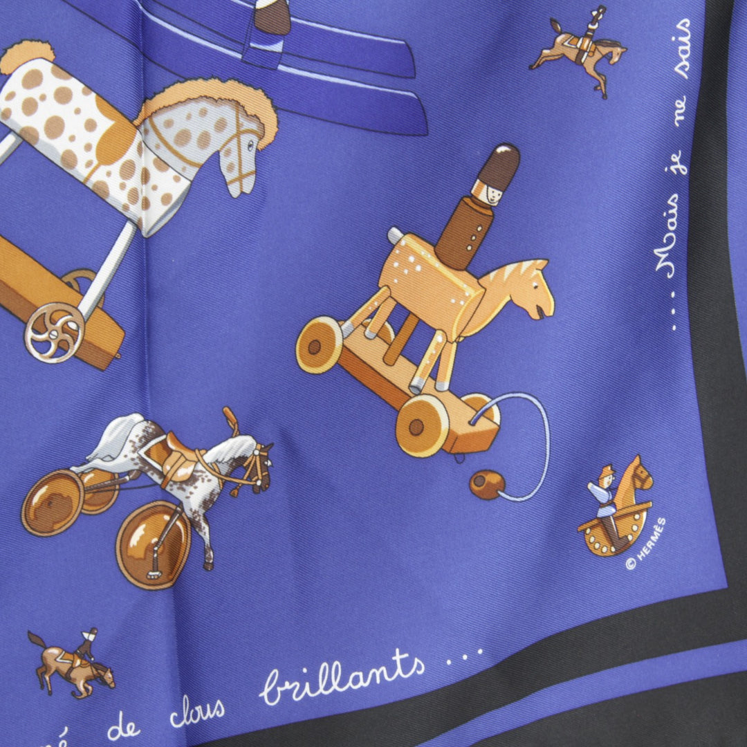 美品『USED』 
HERMES エルメス 
 カレ90 お馬の話をして スカーフ 
シルク ブルー×ブラック 可愛い 馬 木馬 ダークカラー