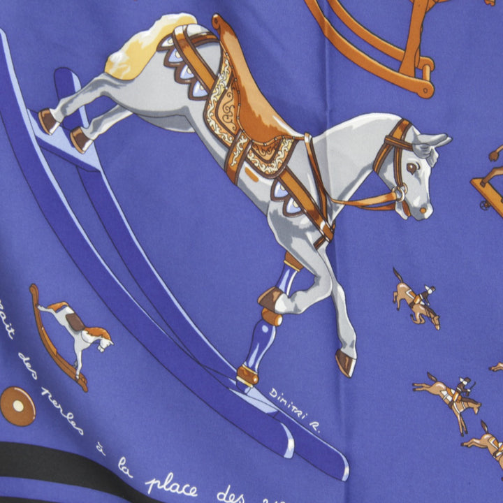 美品『USED』 
HERMES エルメス 
 カレ90 お馬の話をして スカーフ 
シルク ブルー×ブラック 可愛い 馬 木馬 ダークカラー