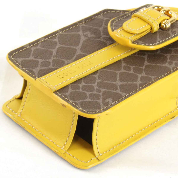 美品『USED』 
NINA RICCI ニナリッチ 
 ポーチ 
レザー イエロー
