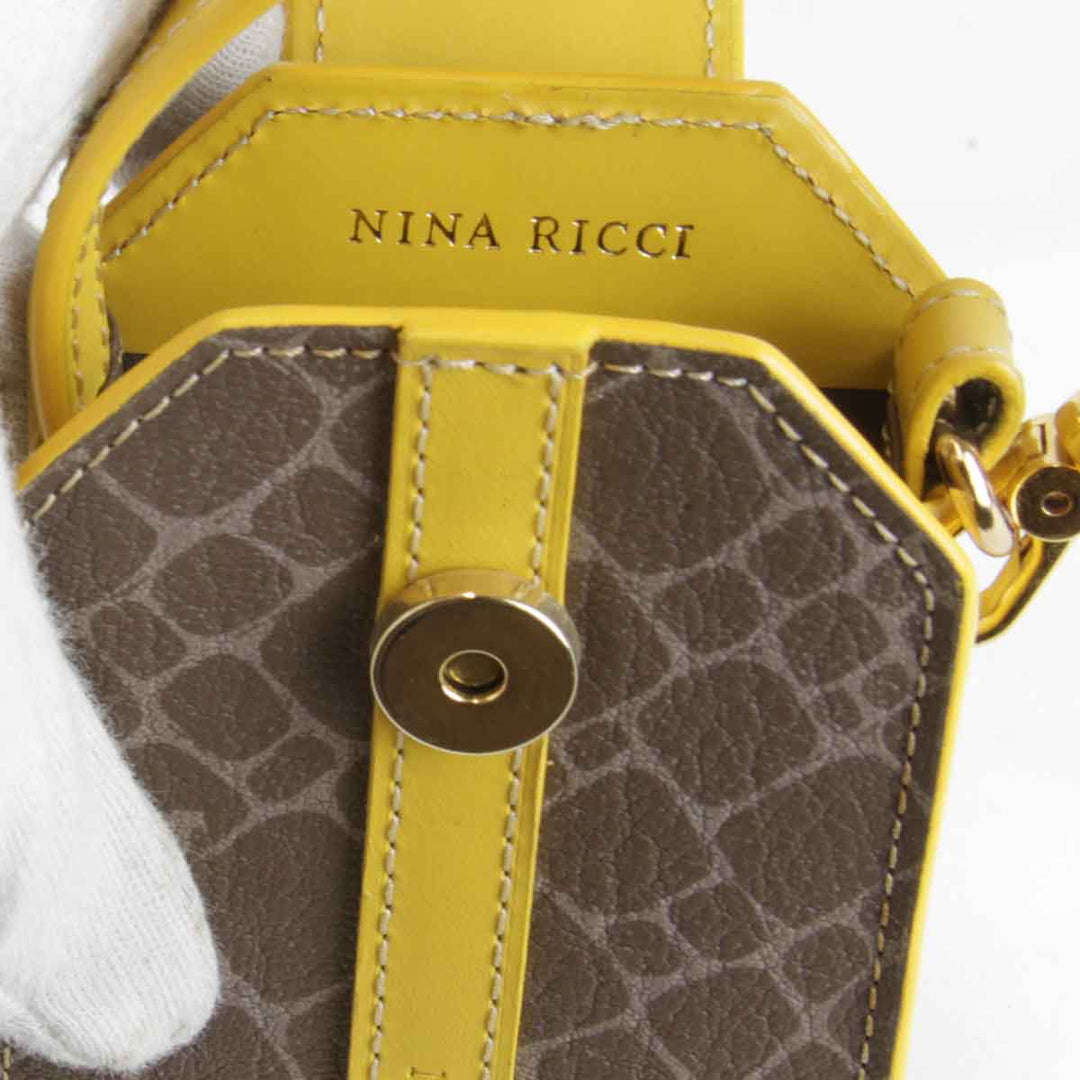 美品『USED』 
NINA RICCI ニナリッチ 
 ポーチ 
レザー イエロー