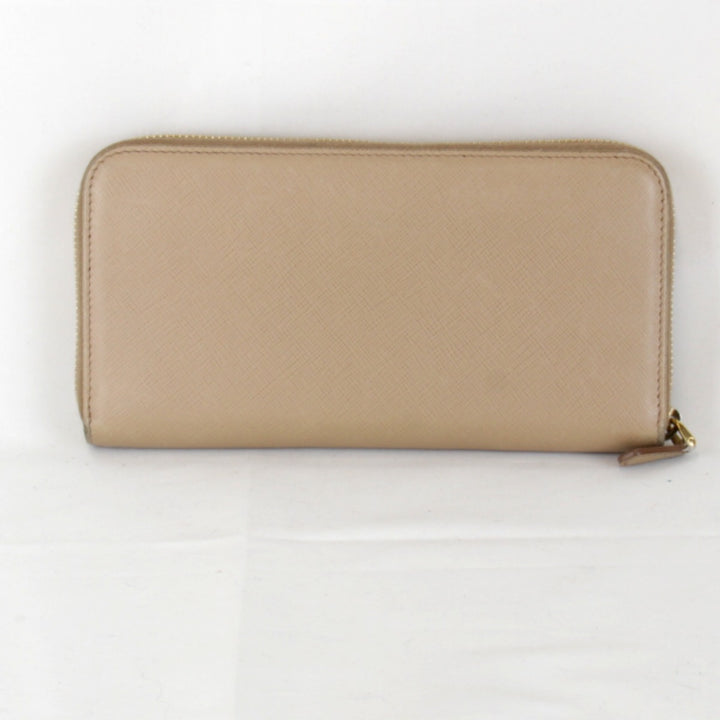 『USED』 
PRADA プラダ 
 サフィアーノ ラウンドジップウォレット 1ML506 長財布 
レザー ブラウン