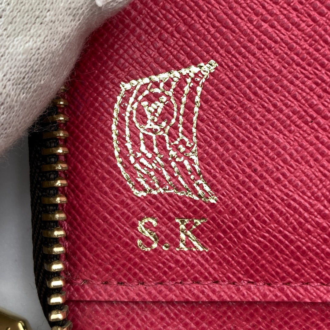 LOUIS VUITTON ルイ・ヴィトン 
 M62581 長財布 
PVC ブラウン