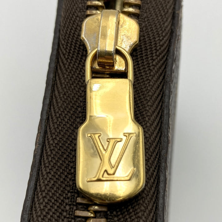 LOUIS VUITTON ルイ・ヴィトン 
 M62581 長財布 
PVC ブラウン