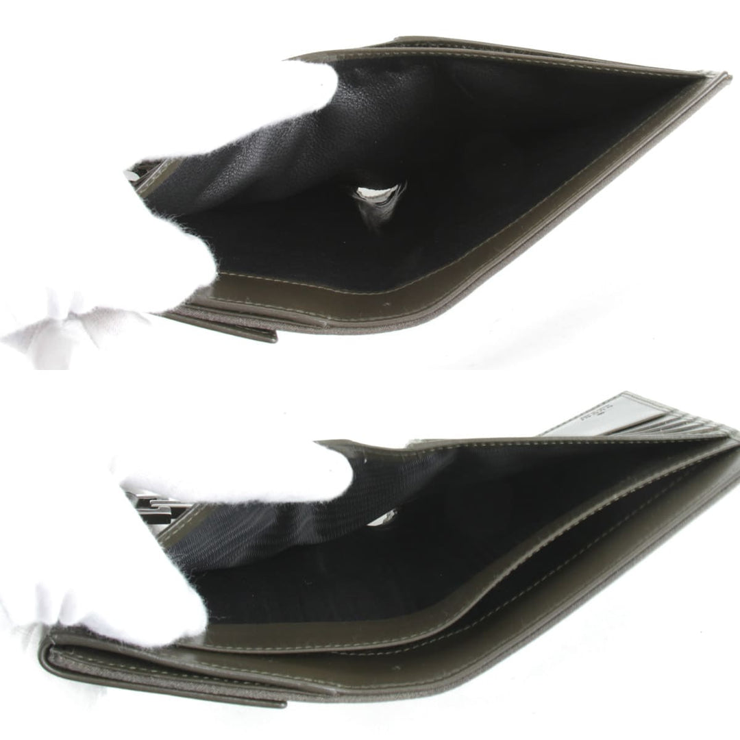 美品『USED』 
GUCCI グッチ 
 035・204249・2131 二つ折り財布 
レザー カーキ
