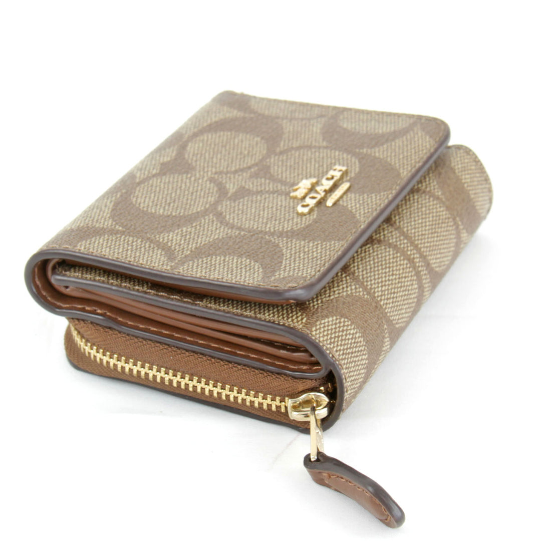 美品『USED』 
COACH コーチ 
 シグネチャー F41302 三つ折り財布 
PVCコーティングキャンバス ベージュ