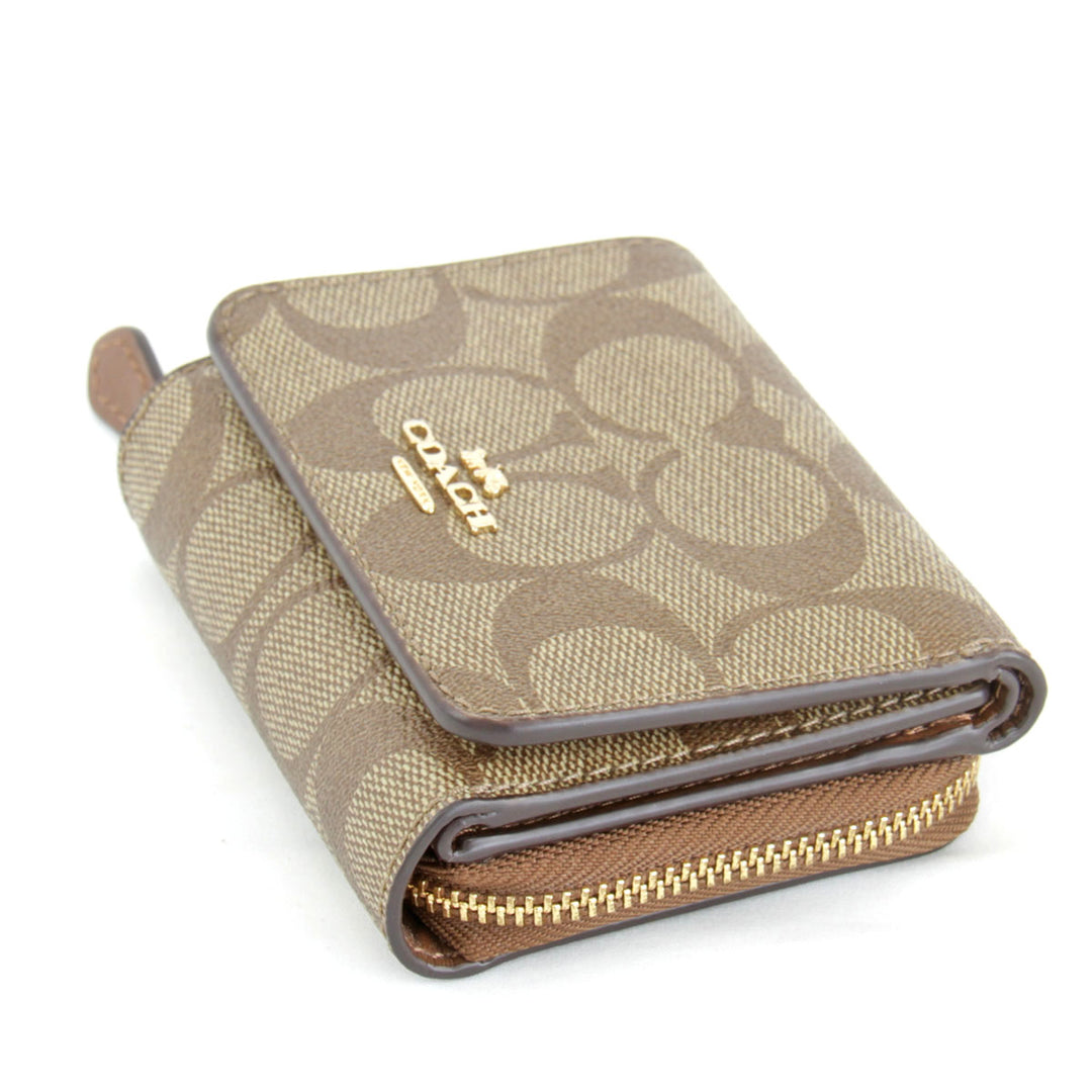 美品『USED』 
COACH コーチ 
 シグネチャー F41302 三つ折り財布 
PVCコーティングキャンバス ベージュ