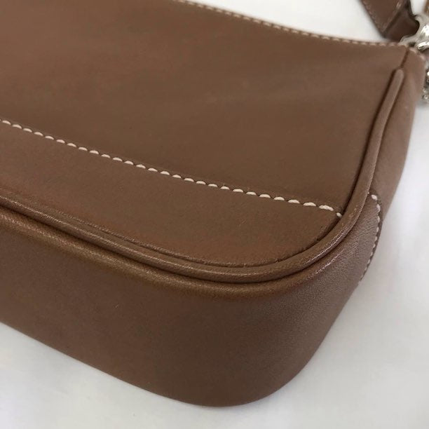 『USED』 
COACH コーチ 
 ハンプトンレザーデミポーチ 7785 アクセサリーポーチ 
レザー ブラウン