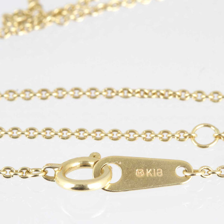 美品『USED』 K18/パール  /ブラウンダイヤモンド 
MIKIMOTO  リバーシブルデザイン クロスネックレス ネックレス
 8.2g
