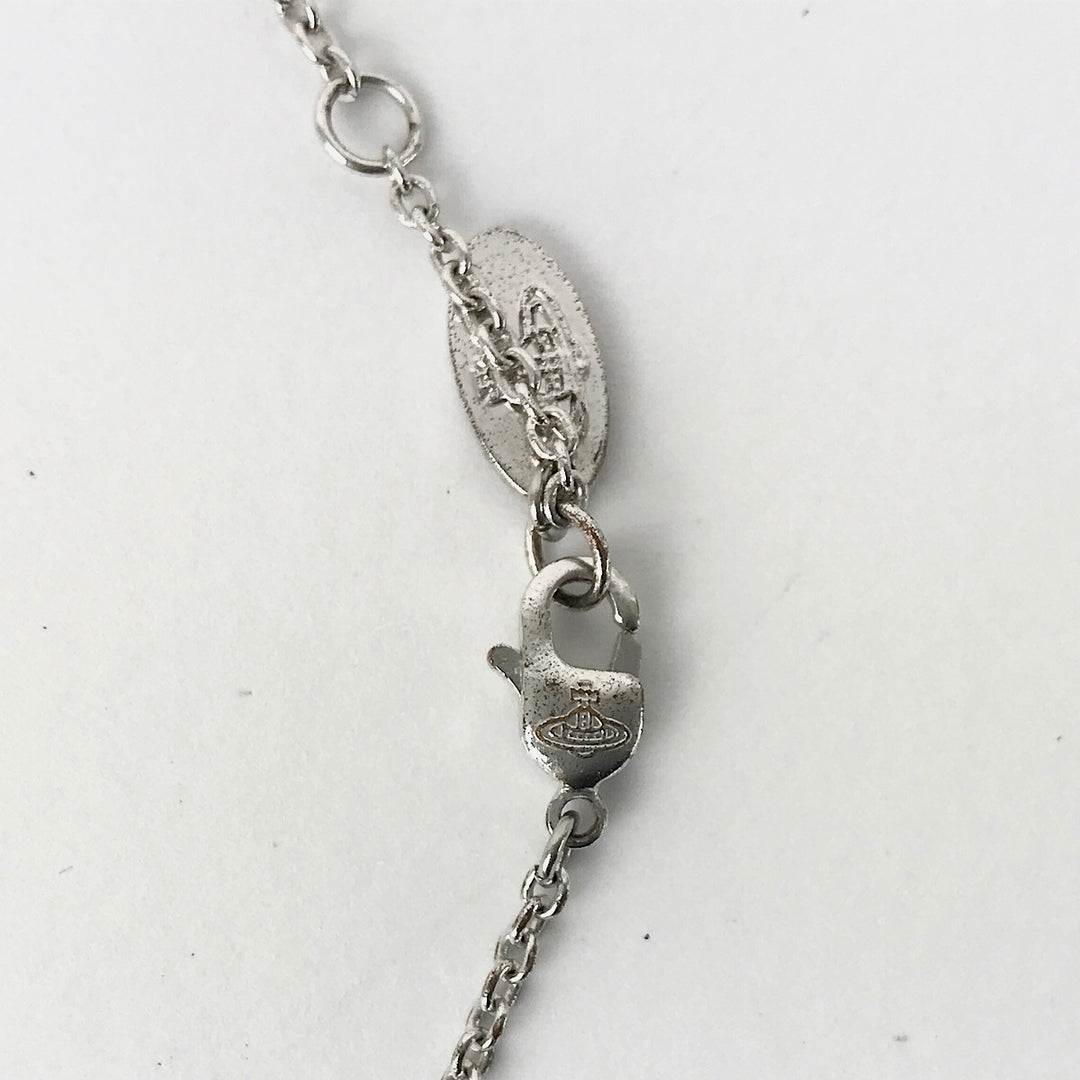 『USED』 真鍮/クリスタル  
Vivienne Westwood  ディアマンテハートペンダント ネックレス
 5.5g