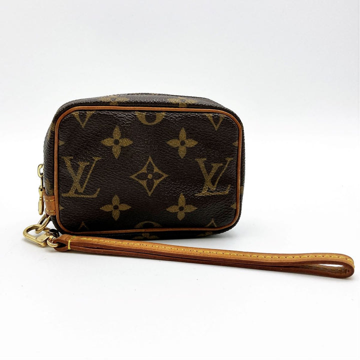 LOUIS VUITTON ルイ・ヴィトン 
 トゥルース・ワピティ M58030 ポーチ 
PVC ブラウン
