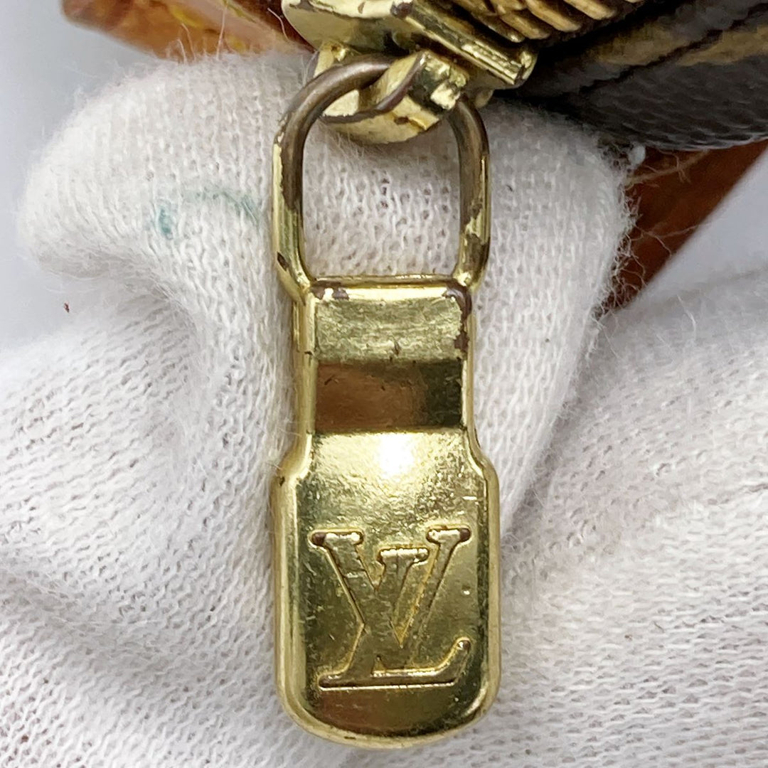 LOUIS VUITTON ルイ・ヴィトン 
 トゥルース・ワピティ M58030 ポーチ 
PVC ブラウン