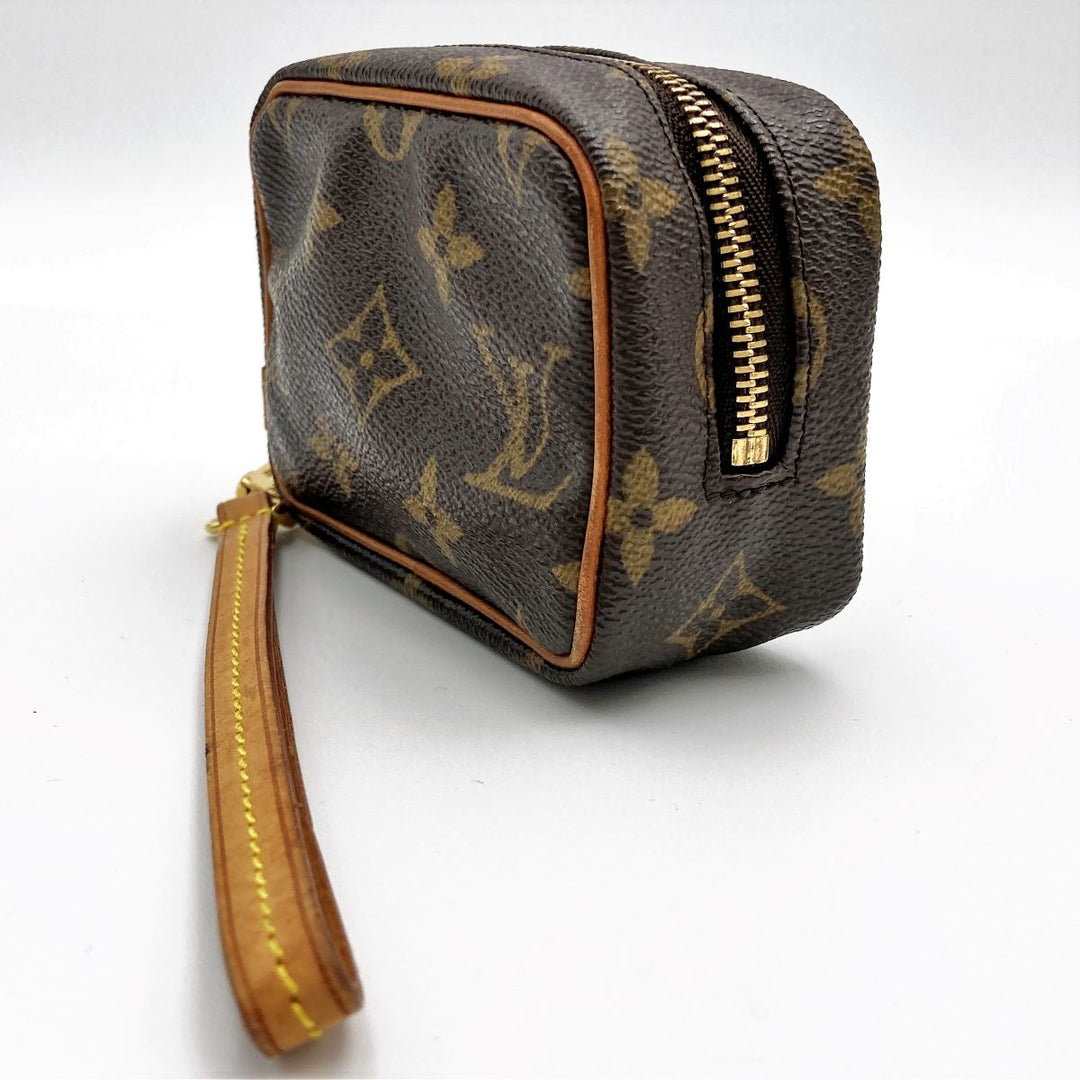 LOUIS VUITTON ルイ・ヴィトン 
 トゥルース・ワピティ M58030 ポーチ 
PVC ブラウン