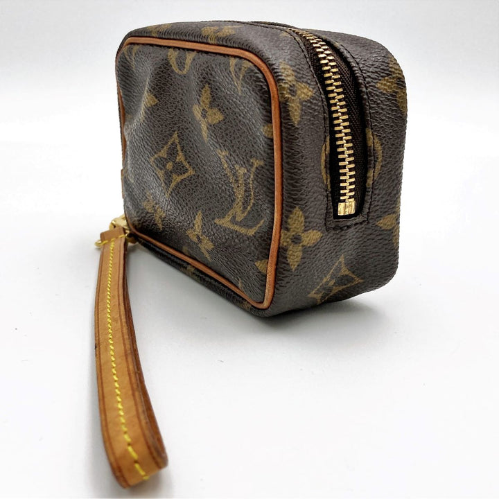 LOUIS VUITTON ルイ・ヴィトン 
 トゥルース・ワピティ M58030 ポーチ 
PVC ブラウン