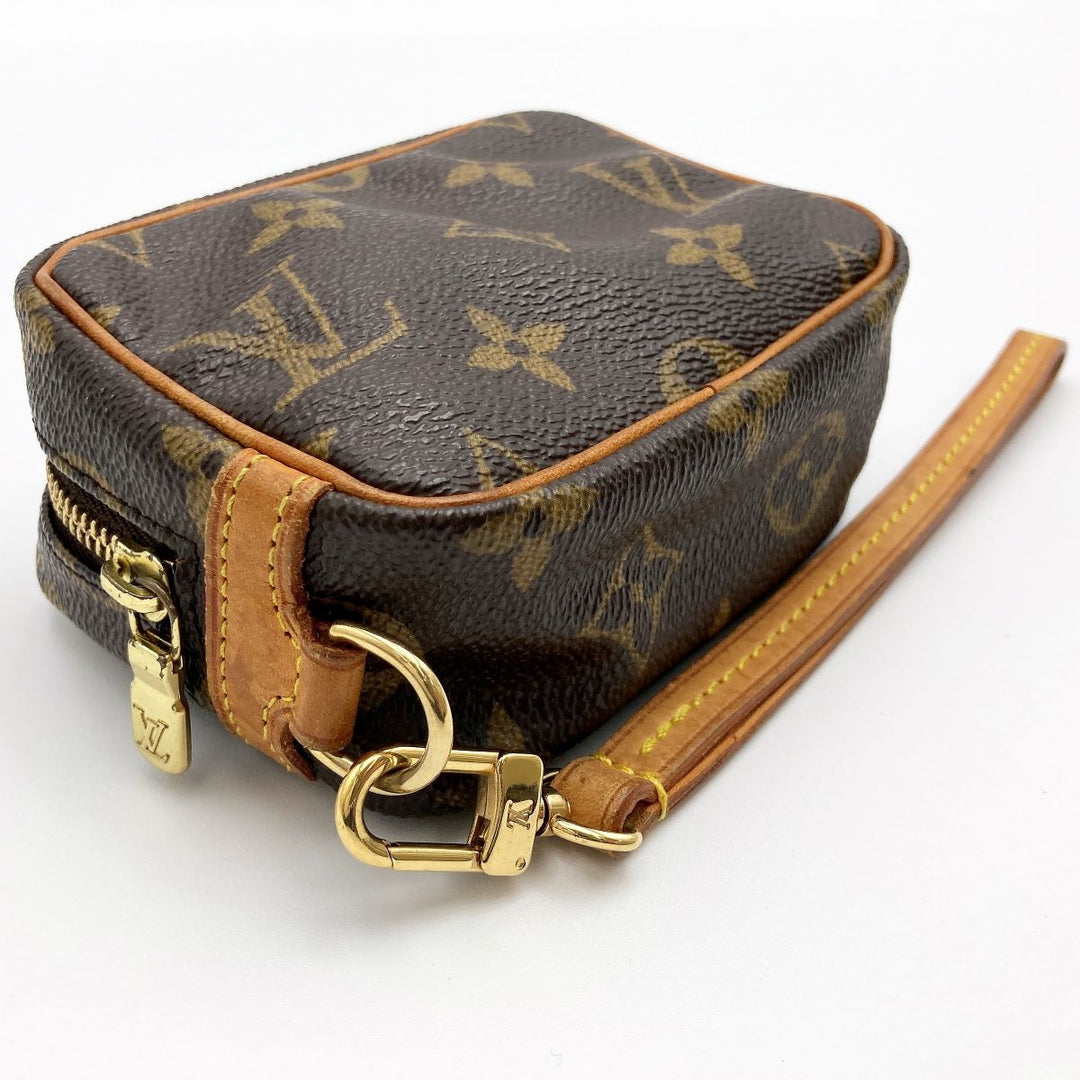 LOUIS VUITTON ルイ・ヴィトン 
 トゥルース・ワピティ M58030 ポーチ 
PVC ブラウン