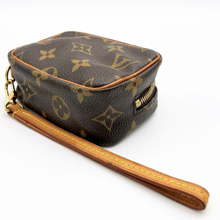 LOUIS VUITTON ルイ・ヴィトン 
 トゥルース・ワピティ M58030 ポーチ 
PVC ブラウン