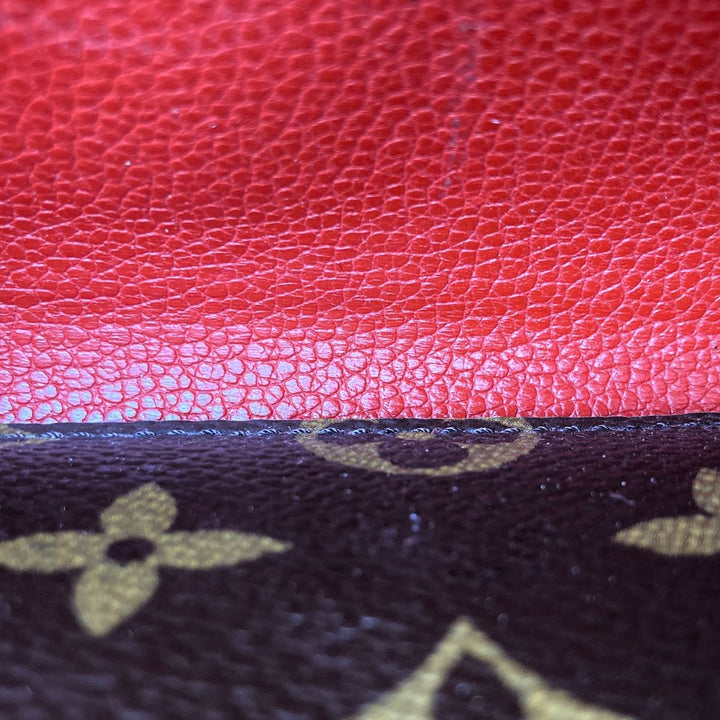 LOUIS VUITTON ルイ・ヴィトン 
 M61836  長財布 
PVC/レザー  レッド